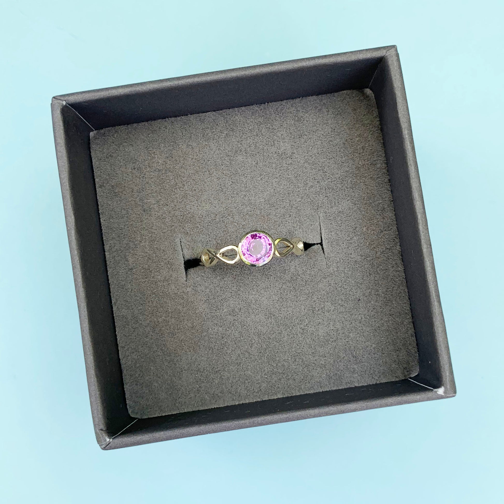 9ct white gold purple sapphire ring, infinite white gold ring, 9ct white gold ring, white gold purple sapphire ring, sapphire ring, gold purple sapphire ring, gold infinite sapphire ring