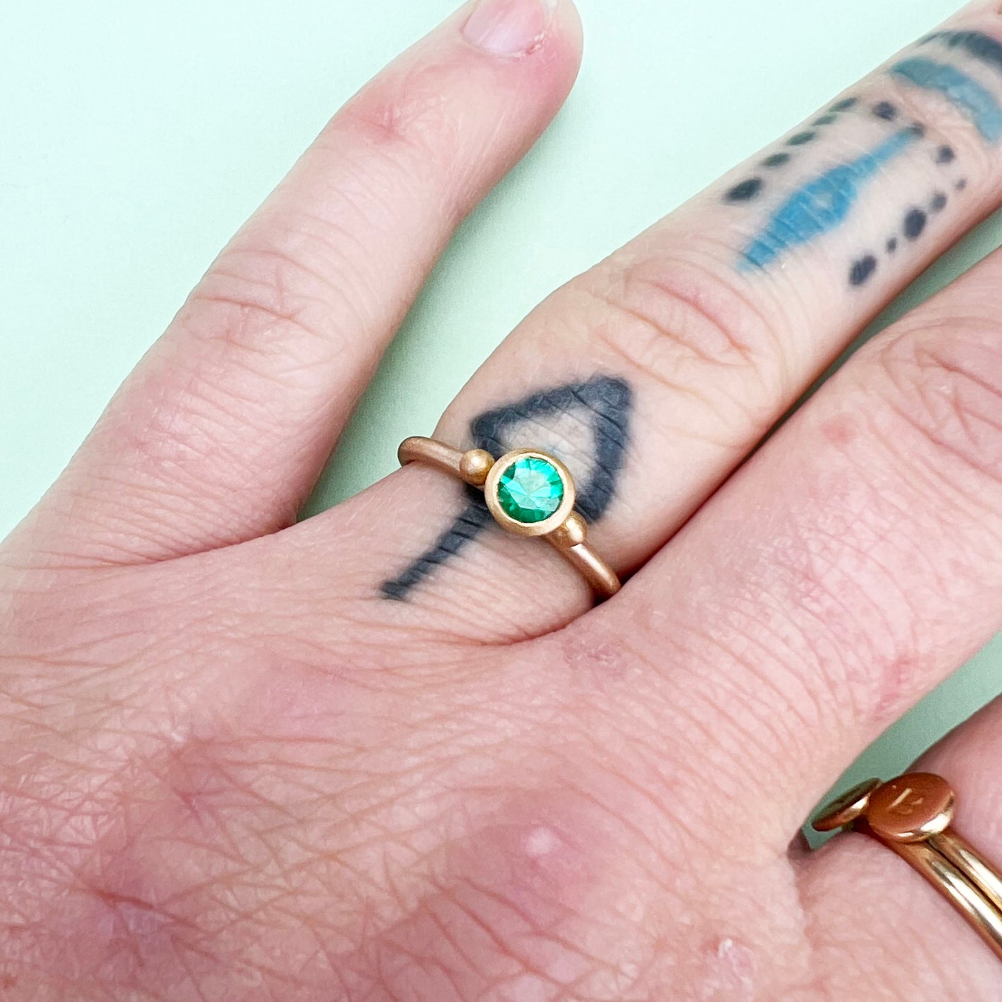 22ct yellow gold emerald ring, zambian emerald ring, 22ct gold ring, Zambian emerald 22ct gold ring, gold satin finish ring, emerald, 9ct gold satin finish shank