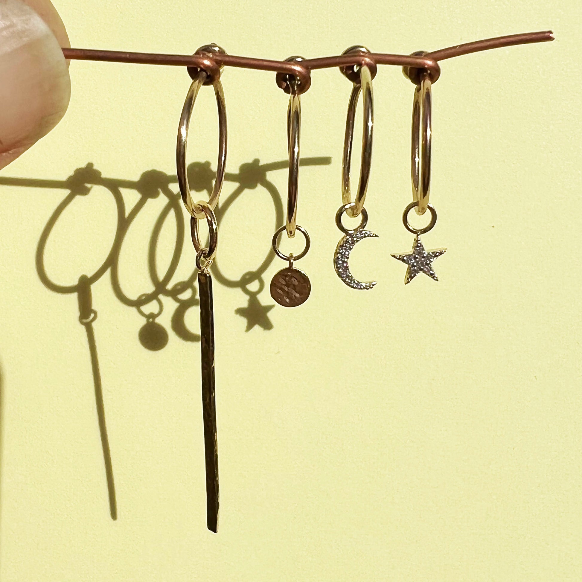 delicate 9ct gold hoop and drop earrings, 9ct gold earrings, polished gold earrings, yellow gold star earrings, 9ct yellow gold crescent moon earring, gold circle hoop earring, gold bar hoop earring