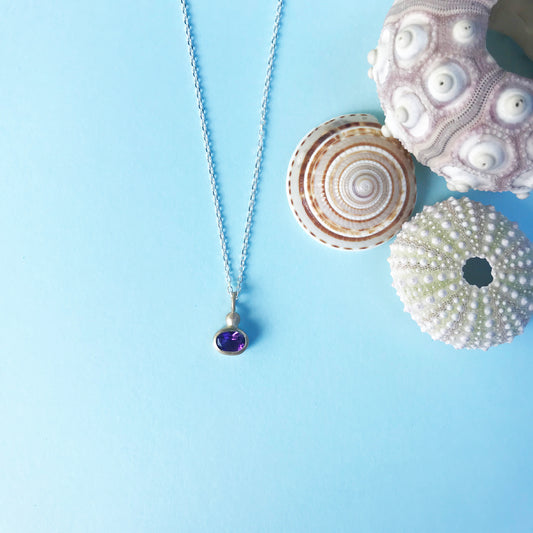 9ct gold and amethyst pendant on silver chain and gold detailing, 9ct gold necklace, 9ct gold amethyst necklace, oval amethyst bezel, amethyst necklace, gold amethyst necklcae